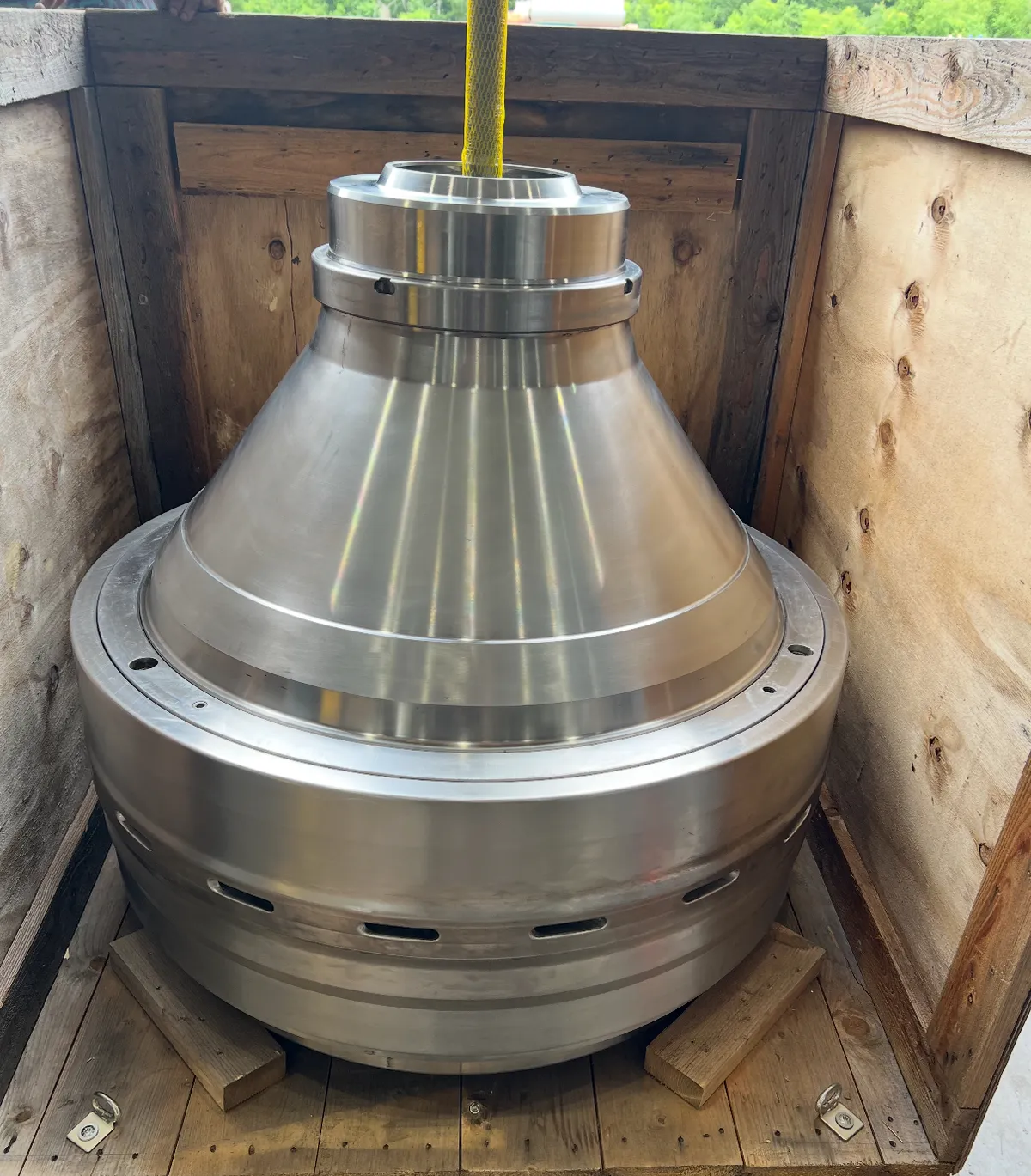 Precision-machined centrifuge bowl component crated at KMS