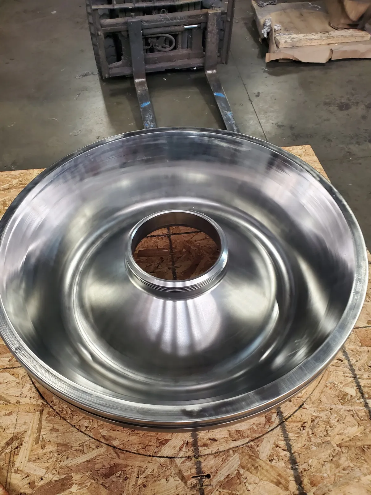 Polished centrifuge bowl head restored by KMS