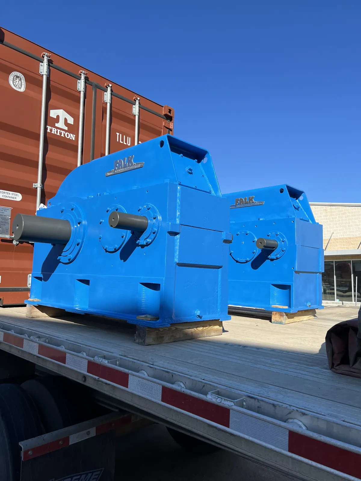 Large rebuilt gearbox loaded on a trailer for delivery from KMS