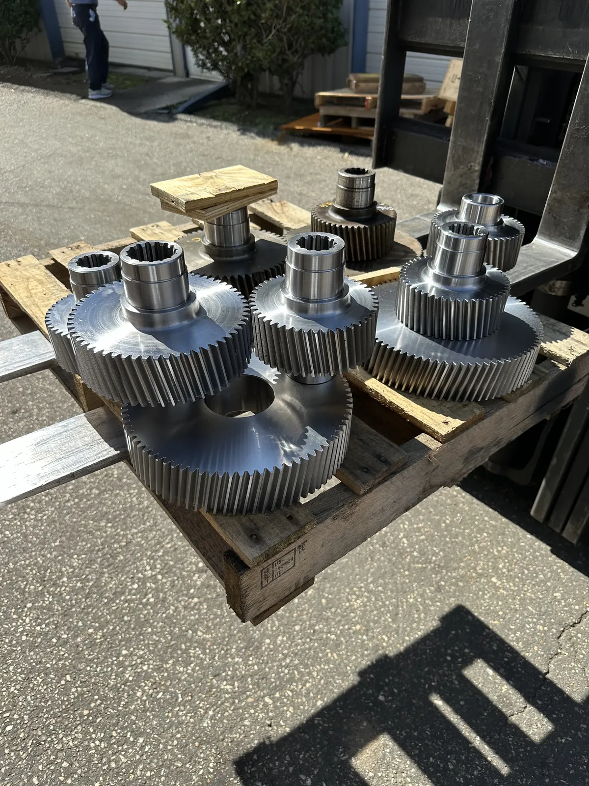 Machined gear shafts and components during a KMS gearbox rebuild